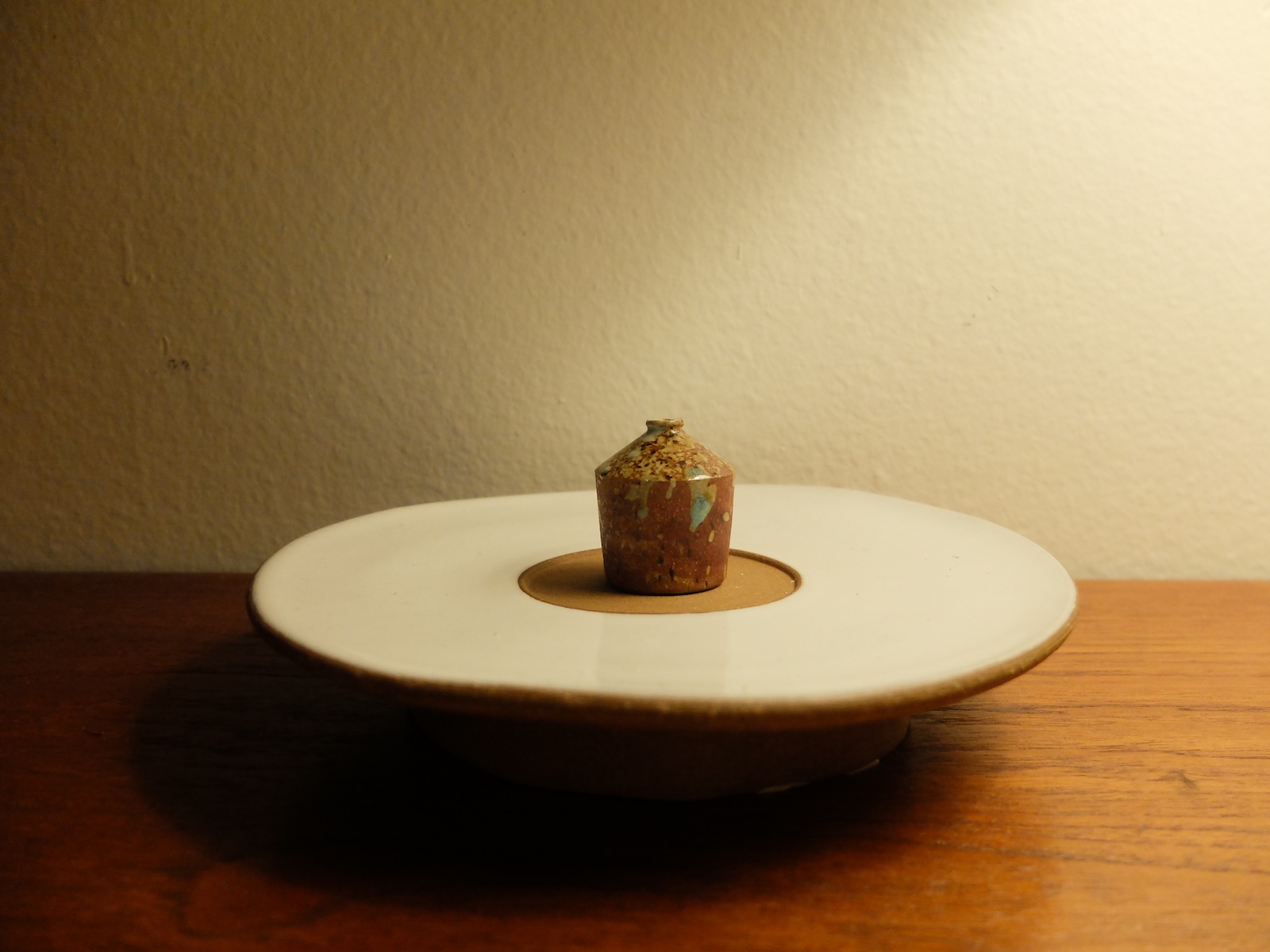 photo of a travel vase on a windowsill